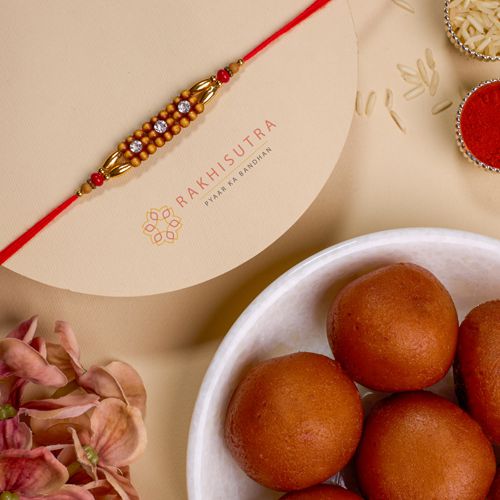 Elegant AD Rakhi N Gulab Jamun Combo